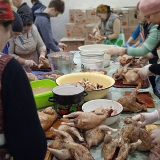 Cleaning chickens to feed people in Ukraine